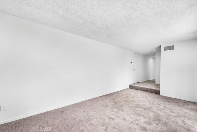 19147 Ingomar St, Reseda, CA 91335 - carpeted empty room with a textured ceiling