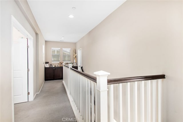 29443 Moorings Ct, Menifee, CA 92585 - hallway featuring an upstairs landing, light colored carpet, and recessed lighting