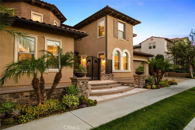 2282 E Rosecrans Ct, Brea, CA 92821 - mediterranean / spanish house featuring stucco siding and a tiled roof