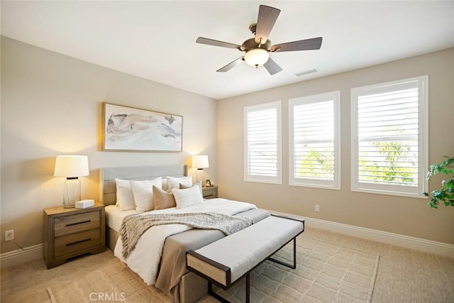 2282 E Rosecrans Ct, Brea, CA 92821 - bedroom featuring multiple windows, light carpet, and ceiling fan