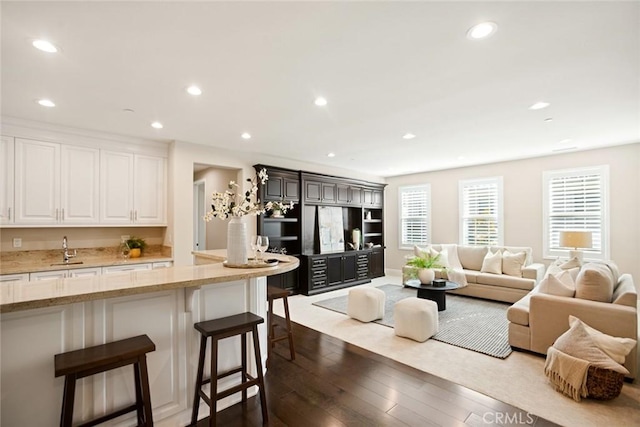 2282 E Rosecrans Ct, Brea, CA 92821 - living area featuring dark wood-style floors and recessed lighting