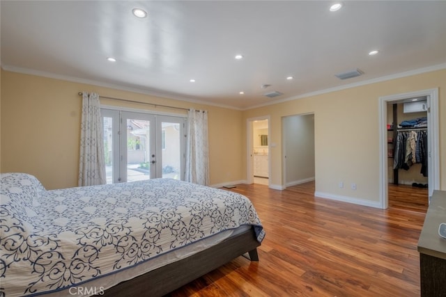 1741 Wabasso Way, Glendale, CA 91208 - bedroom with french doors, access to outside, a walk in closet, ornamental molding, and wood finished floors