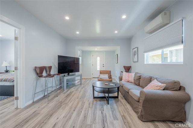 1741 Wabasso Way, Glendale, CA 91208 - living room with a wall unit AC, light wood finished floors, and recessed lighting