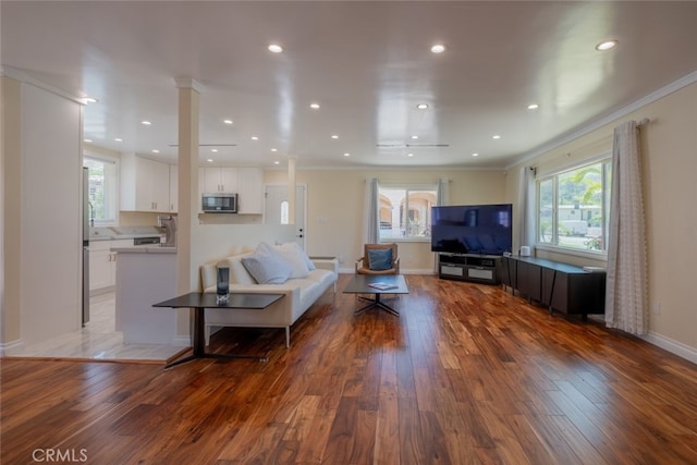 1741 Wabasso Way, Glendale, CA 91208 - living room featuring light wood-style flooring, ornamental molding, and recessed lighting