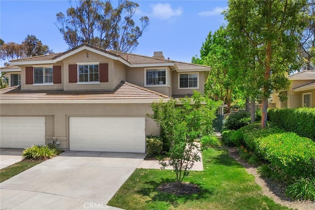 1320 Canterbury Ln, Fullerton, CA 92831 - view of front of property featuring a tile roof, stucco siding, driveway, a garage, and a chimney