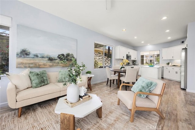 1320 Canterbury Ln, Fullerton, CA 92831 - living room featuring healthy amount of natural light, light wood-style flooring, and recessed lighting