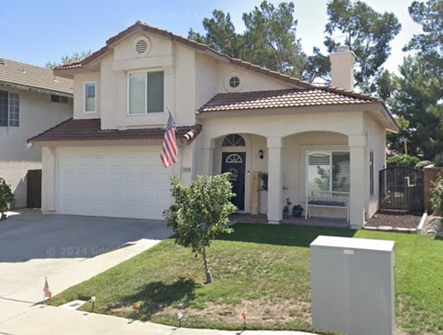 11143 Amarillo St, Rancho Cucamonga, CA 91701 - mediterranean / spanish house with a chimney, a tiled roof, concrete driveway, and a garage