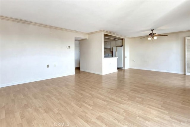 4001 Calle Sonora Unit 3E, Laguna Woods, CA 92637 - unfurnished living room featuring ceiling fan, light wood finished floors, and ornamental molding