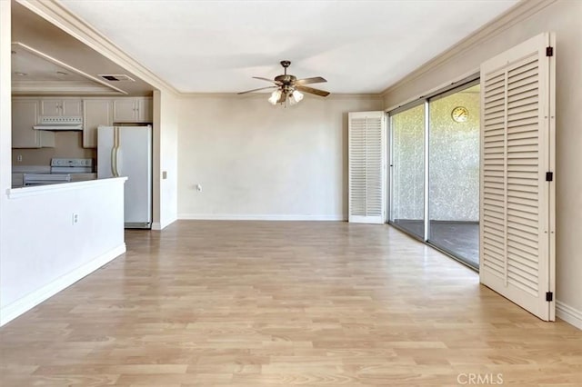 4001 Calle Sonora Unit 3E, Laguna Woods, CA 92637 - unfurnished living room featuring ceiling fan, ornamental molding, and light wood finished floors
