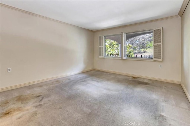 4001 Calle Sonora Unit 3E, Laguna Woods, CA 92637 - carpeted spare room featuring crown molding and baseboards
