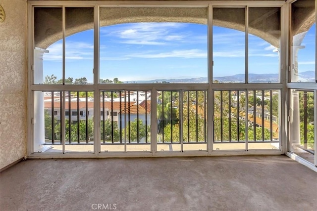 4001 Calle Sonora Unit 3E, Laguna Woods, CA 92637 - unfurnished sunroom with a mountain view and healthy amount of natural light