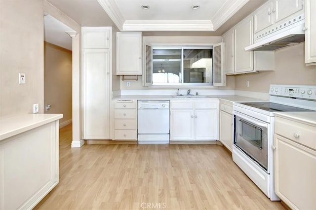 4001 Calle Sonora Unit 3E, Laguna Woods, CA 92637 - kitchen featuring white appliances, ornamental molding, extractor fan, light wood-type flooring, and white cabinets