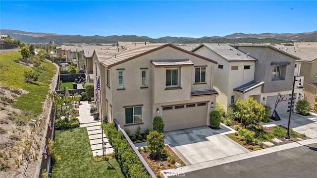 3372 Ivy Way, Rancho Mission Viejo, CA 92694 - view of front of house featuring a mountain view, a garage, and stucco siding
