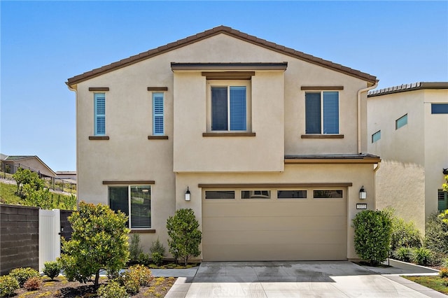 3372 Ivy Way, Rancho Mission Viejo, CA 92694 - view of front facade featuring concrete driveway, an attached garage, and stucco siding