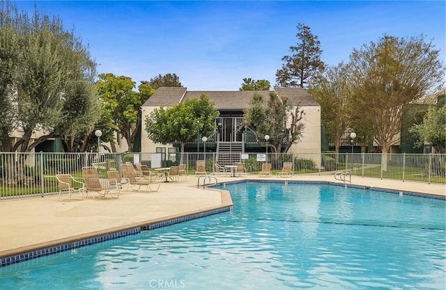 15300 Ocaso Ave Unit E102, La Mirada, CA 90638 - community pool featuring a patio