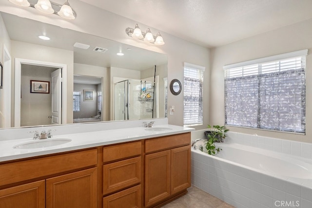 29306 St Andrews, Lake Elsinore, CA 92530 - bathroom with a stall shower, double vanity, a garden tub, and tile patterned flooring