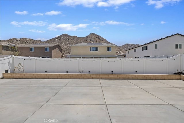 27240 Lost Palm St, Menifee, CA 92585 - fenced backyard with a mountain view and a patio