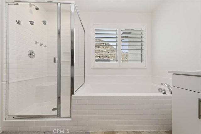 27240 Lost Palm St, Menifee, CA 92585 - full bath with a garden tub, a stall shower, and vanity