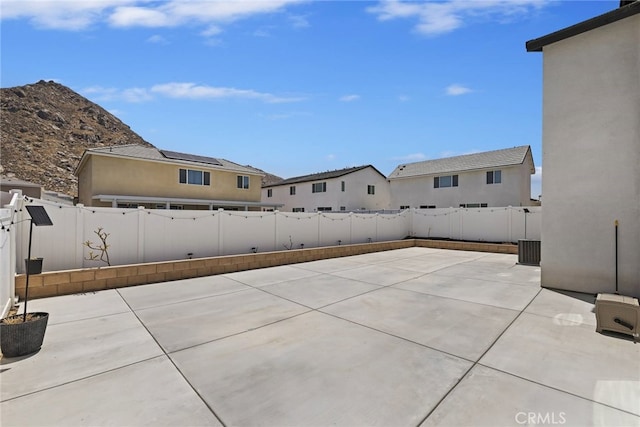 27240 Lost Palm St, Menifee, CA 92585 - fenced backyard featuring a patio and a mountain view