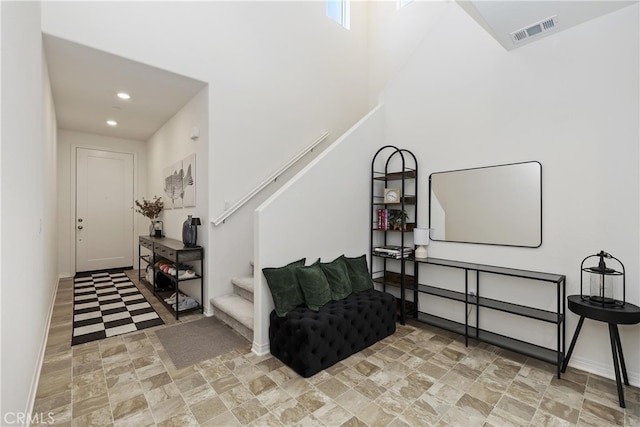 27240 Lost Palm St, Menifee, CA 92585 - living area featuring stairs, recessed lighting, and a high ceiling