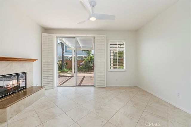 31042 Bunker Dr, Temecula, CA 92591 - unfurnished living room featuring a fireplace, ceiling fan, and light tile patterned floors