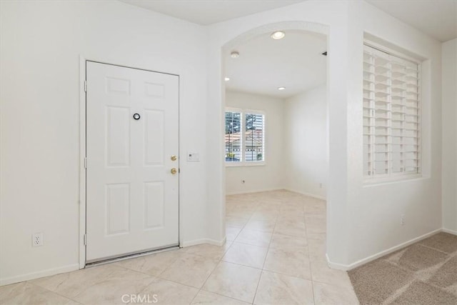 31042 Bunker Dr, Temecula, CA 92591 - foyer entrance featuring arched walkways and light tile patterned floors
