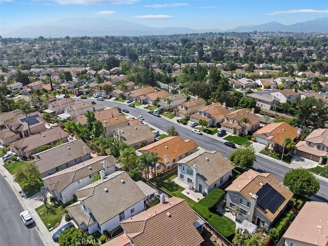 31042 Bunker Dr, Temecula, CA 92591 - aerial perspective of suburban area featuring a mountainous background