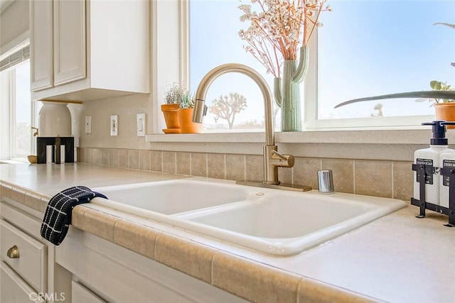 1001 Gibralter Rd, Landers, CA 92285 - kitchen view of light countertops and white cabinetry