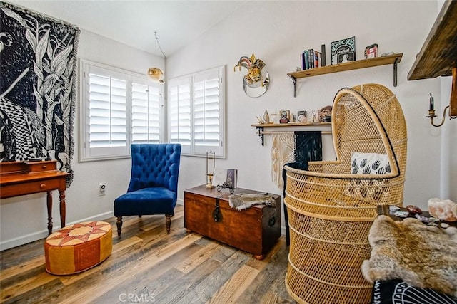 1001 Gibralter Rd, Landers, CA 92285 - sitting room featuring wood finished floors and lofted ceiling