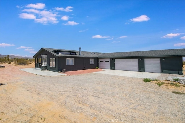 1001 Gibralter Rd, Landers, CA 92285 - ranch-style home featuring driveway and a garage