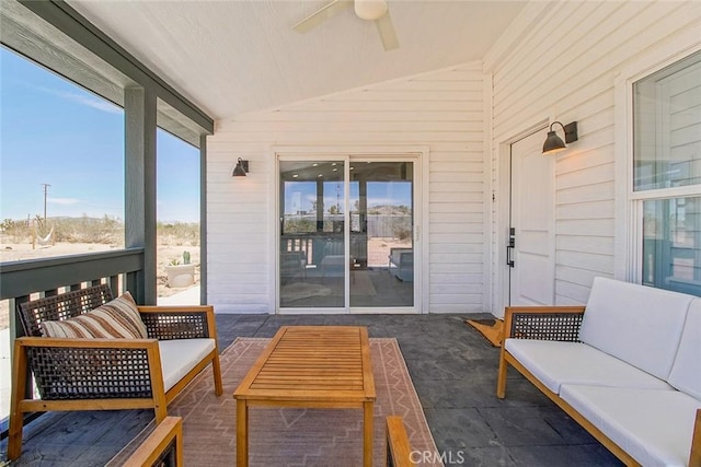 1001 Gibralter Rd, Landers, CA 92285 - sunroom with vaulted ceiling, ceiling fan, and an outdoor hangout area