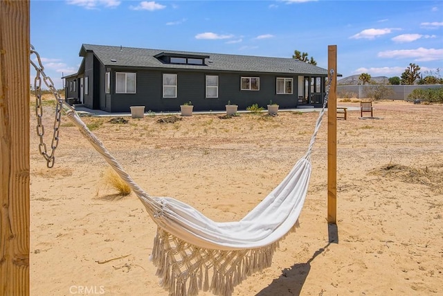 1001 Gibralter Rd, Landers, CA 92285 - back of property with roof with shingles