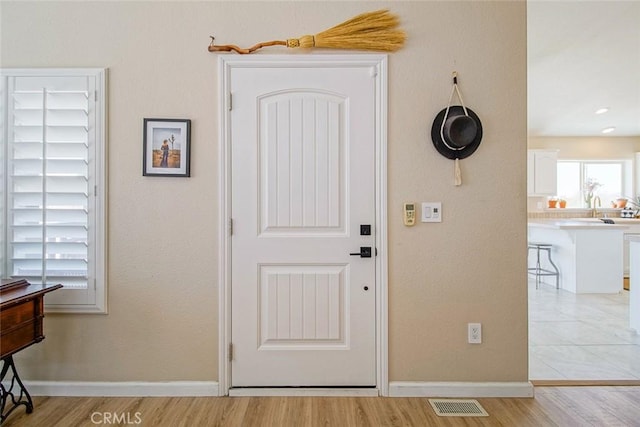 1001 Gibralter Rd, Landers, CA 92285 - entrance foyer featuring light wood finished floors