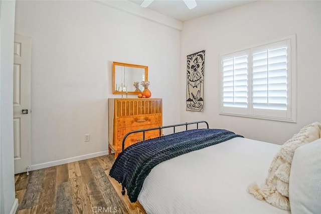 1001 Gibralter Rd, Landers, CA 92285 - bedroom with wood finished floors and ceiling fan