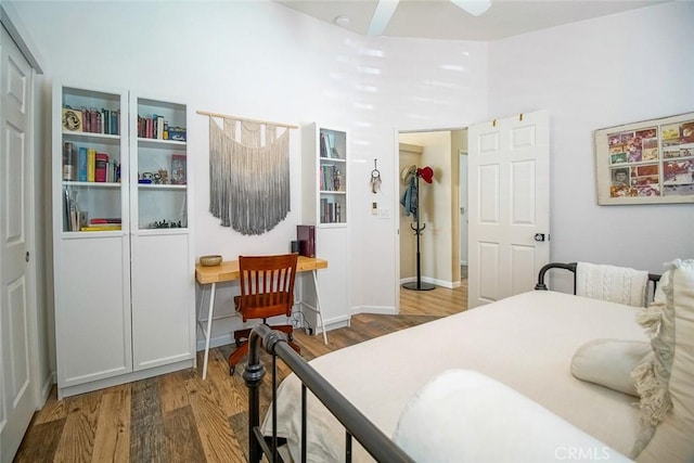 1001 Gibralter Rd, Landers, CA 92285 - bedroom featuring wood finished floors and a towering ceiling