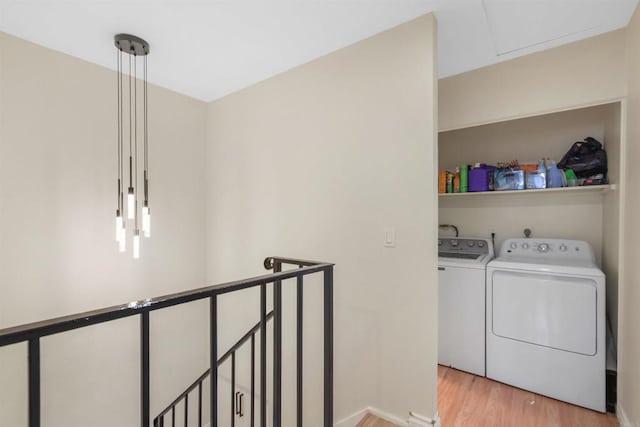 1450 Melrose Ave Unit 31, Chula Vista, CA 91911 - washroom featuring washer and clothes dryer and light wood-type flooring