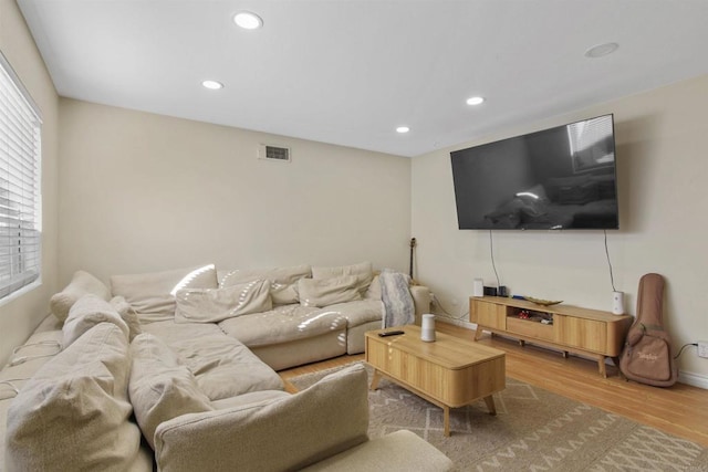 1450 Melrose Ave Unit 31, Chula Vista, CA 91911 - living room with wood finished floors, plenty of natural light, and recessed lighting
