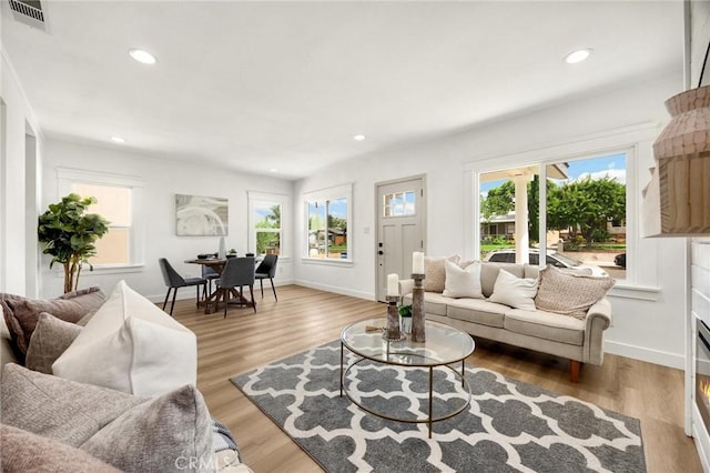 5336 Stratford Rd, Los Angeles, CA 90042 - living area featuring healthy amount of natural light, light wood-type flooring, and recessed lighting