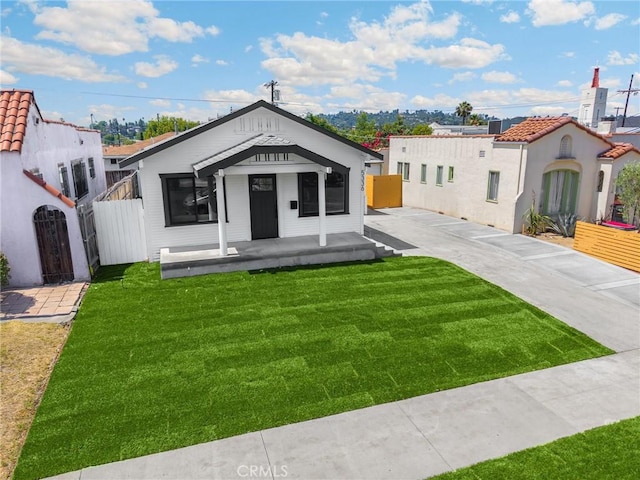 5336 Stratford Rd, Los Angeles, CA 90042 - view of front of house featuring a porch and a tiled roof