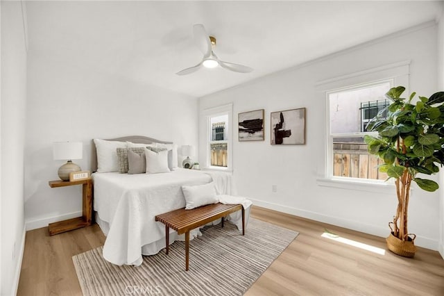 5336 Stratford Rd, Los Angeles, CA 90042 - bedroom featuring wood finished floors, multiple windows, and ceiling fan