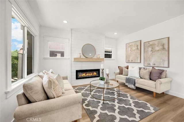 5336 Stratford Rd, Los Angeles, CA 90042 - living room featuring a fireplace, wood finished floors, and recessed lighting