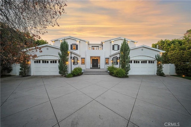 17528 Jayden Ln, Encino, CA 91316 - view of front facade featuring concrete driveway and a garage