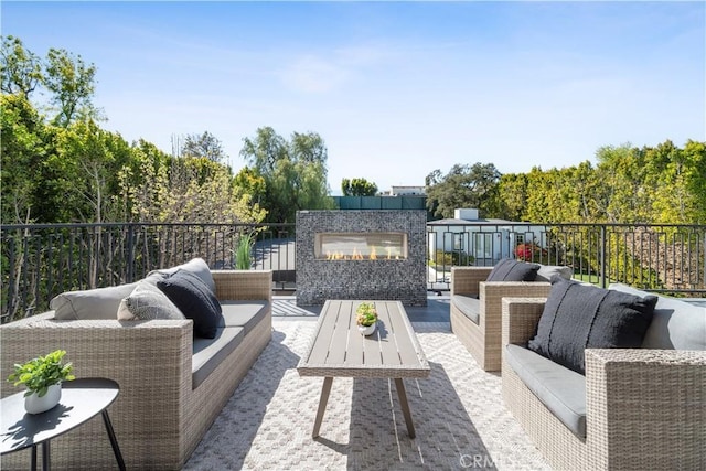 17528 Jayden Ln, Encino, CA 91316 - deck featuring an outdoor living space with a fireplace and a patio area