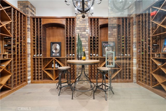 17528 Jayden Ln, Encino, CA 91316 - wine cellar with a chandelier