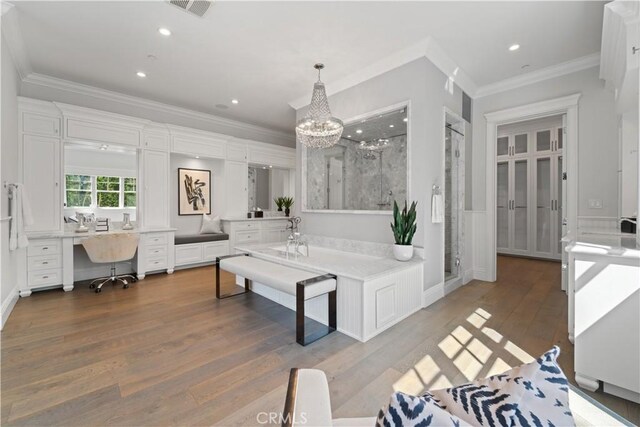 17528 Jayden Ln, Encino, CA 91316 - living room with ornamental molding, wood finished floors, a chandelier, recessed lighting, and built in study area