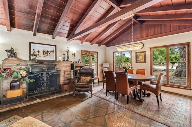 5729 Grandview Ave, Yorba Linda, CA 92886 - dining room featuring wood ceiling, a fireplace with raised hearth, and stone tile flooring