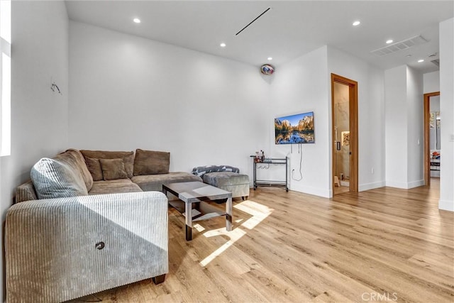 6904 Corbin Ave, Reseda, CA 91335 - living room with light wood finished floors and recessed lighting