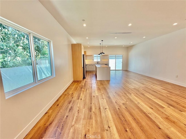 6904 Corbin Ave, Reseda, CA 91335 - unfurnished room with light wood finished floors and recessed lighting