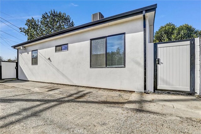 6904 Corbin Ave, Reseda, CA 91335 - view of property exterior with a gate and stucco siding