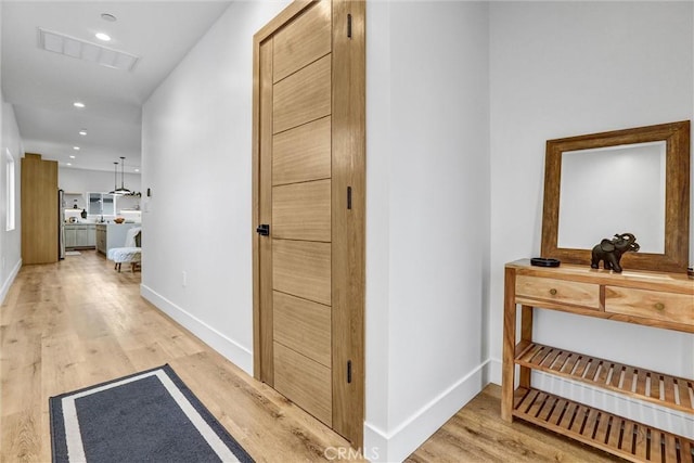 6904 Corbin Ave, Reseda, CA 91335 - hallway with light wood-style flooring and recessed lighting